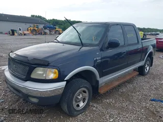 2001 Ford F-150 XLT with VIN 1FTRW08L71KF51617, listed as a IAAI auction lot 42765846 with Not provided miles and . Bid and sale history available at DreamBid. Image 2.