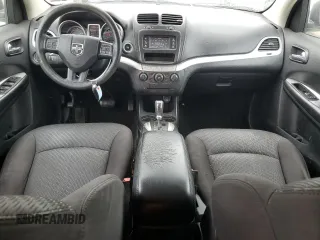 2014 Dodge Journey SE with VIN 3C4PDCAB7ET240936, listed as a Copart auction lot 55115645 with 242,155 mi miles and Salvage title. Bid and sale history available at DreamBid. Image 8.