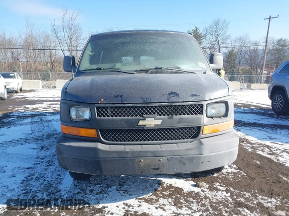 2014 Chevrolet Express Cargo Van with VIN 1GCWGGBA5E1205786, listed as a IAAI auction lot 41339085 with 201,460 mi miles. Bid and sale history available at carsss.com. Image 6.