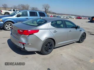 2015 Kia Optima LX with VIN 5XXGM4A78FG477630, listed as a IAAI auction lot 41771874 with 107,065 mi miles and . Bid and sale history available at DreamBid. Image 12.