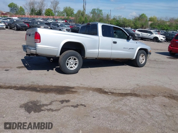 2001 Dodge Dakota SLT with VIN 1B7GG22XX1S348751, listed as a IAAI auction lot 42077395 with 148,034 mi miles and . Bid and sale history available at carsss.com. Image 4.