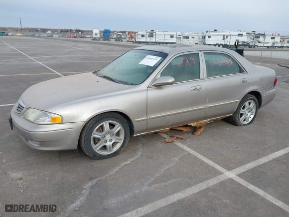 2002 Mazda 626 LX with VIN 1YVGF22DX25263864, listed as a IAAI auction lot 41846129 with 282,516 mi miles. Bid and sale history available at carsss.com. Image 2.