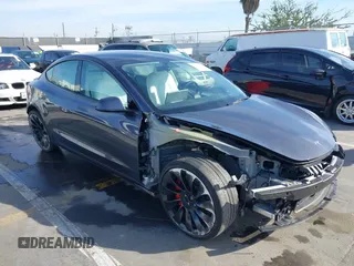 2023 Tesla Model 3 Performance with VIN 5YJ3E1EC4PF705449, listed as a IAAI auction lot 41587026 with 30,292 mi miles. Bid and sale history available at carsss.com. Image 1.