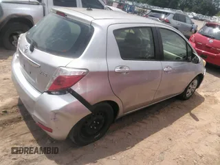 2012 Toyota Yaris L with VIN JTDKTUD35CD531056, listed as a IAAI auction lot 42169341 with 114,955 mi miles. Bid and sale history available at carsss.com. Image 4.