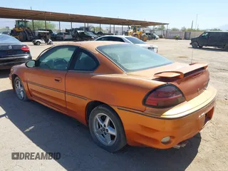 2003 Pontiac Grand Am z VIN 1G2NV12E23C308025, wystawiony jako IAAI lot #42458294 z przebiegiem 205 349 mil mil oraz . Historia ofert i sprzedaży dostępna na DreamBid. Obrazek 3.