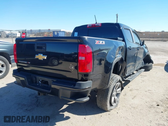 2018 Chevrolet Colorado 2WD Z71 with VIN 1GCGSDEN7J1117011, listed as a IAAI auction lot 41728108 with 51,618 mi miles and . Bid and sale history available at DreamBid. Image 4.