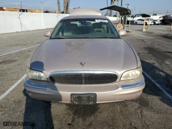 1999 Buick Park Avenue with VIN 1G4CW52K6X4653731, listed as a Copart auction lot 72736444 with 128,471 mi miles and Salvage Title. Bid and sale history available at carsss.com. Image 5.