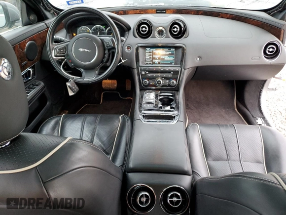 2015 Jaguar XJ with VIN SAJWA2GZ4F8V82350, listed as a Copart auction lot 83824414 with 47,767 mi miles and Salvage Title. Bid and sale history available at carsss.com. Image 8.