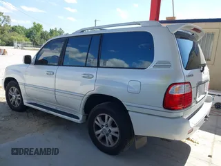 2003 Lexus LX 470 with VIN JTJHT00WX33523623, listed as a IAAI auction lot 42028889 with 317,700 mi miles and . Bid and sale history available at DreamBid. Image 14.