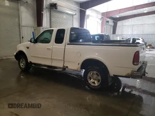 1999 Ford F-150 XL with VIN 2FTRX18L1XCA22096, listed as a Copart auction lot 52402885 with 120,254 mi miles and Salvage Title. Bid and sale history available at carsss.com. Image 2.