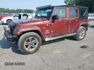 2007 Jeep Wrangler Unlimited Sahara with VIN 1J8GA59167L146604, listed as a Copart auction lot 62456685 with 186,922 mi miles and Salvage title. Bid and sale history available at DreamBid. Image 1.