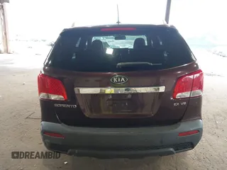 2012 Kia Sorento EX z VIN 5XYKU4A25CG304508, wystawiony jako IAAI lot #42461847 z przebiegiem 20 016 mil mil oraz . Historia ofert i sprzedaży dostępna na DreamBid. Obrazek 16.