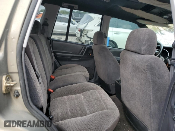 1996 Jeep Grand Cherokee Laredo with VIN 1J4GZ58S3TC297818, listed as a Copart auction lot 67712584 with 284,653 mi miles and Salvage Title. Bid and sale history available at carsss.com. Image 11.