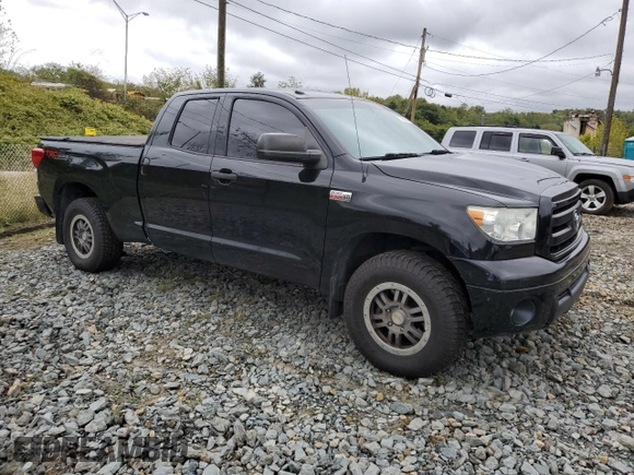 2012 Toyota Tundra 4WD Truck with VIN 5TFUY5F13CX263943, listed as a Copart auction lot 72950504 with 258,542 mi miles and Salvage Title. Bid and sale history available at carsss.com. Image 4.