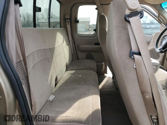 2000 Ford F-150 XL with VIN 2FTRX17W0YCA73568, listed as a Copart auction lot 51128035 with 208,737 mi miles and Salvage Title. Bid and sale history available at carsss.com. Image 10.