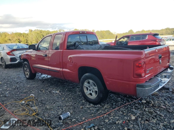 2006 Dodge Dakota SLT z VIN 1D7HE42N76S501233, wystawiony jako Copart lot #80200934 z przebiegiem 281 599 mil mil oraz Szkoda całkowita • Salvage title. Historia ofert i sprzedaży dostępna na DreamBid. Obrazek 2.
