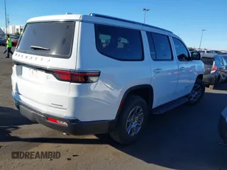 2022 Jeep Wagoneer Series I with VIN 1C4SJVAT8NS220302, listed as a IAAI auction lot 41297633 with 21,019 mi miles and . Bid and sale history available at DreamBid. Image 4.