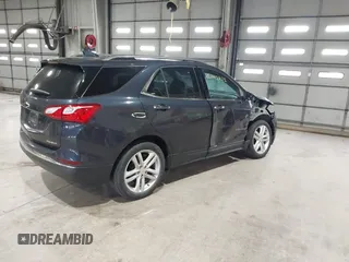 2019 Chevrolet Equinox Premier z VIN 3GNAXNEVXKS500672, wystawiony jako IAAI lot #42042922 z przebiegiem 77 440 mil mil oraz . Historia ofert i sprzedaży dostępna na DreamBid. Obrazek 4.