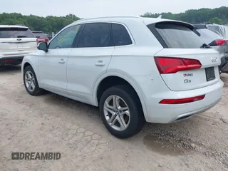 2019 Audi Q5 Premium with VIN WA1ANAFY1K2112834, listed as a IAAI auction lot 42443822 with 98,579 mi miles and . Bid and sale history available at DreamBid. Image 3.