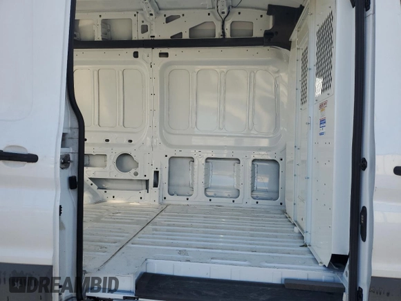 2023 Ford Transit Cargo z VIN 1FTBR3X80PKB02196, wystawiony jako Copart lot #85529414 z przebiegiem 89 528 mil mil oraz Szkoda całkowita • Salvage title. Historia ofert i sprzedaży dostępna na DreamBid. Obrazek 12.
