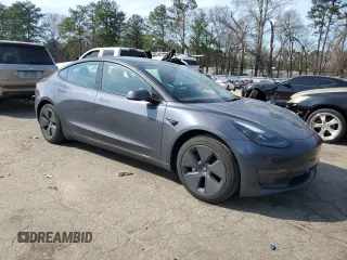 2023 Tesla Model 3 with VIN 5YJ3E1EA8PF699931, listed as a Copart auction lot 49293795 with 13,119 mi miles and Salvage Title. Bid and sale history available at DreamBid. Image 4.