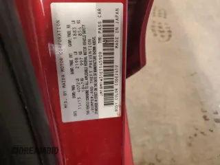 2014 Mazda 3 S Grand Touring z VIN JM1BM1W31E1145909, wystawiony jako Copart lot #53729895 z przebiegiem 125 739 mil mil oraz Szkoda całkowita • Salvage title. Historia ofert i sprzedaży dostępna na DreamBid. Obrazek 13.