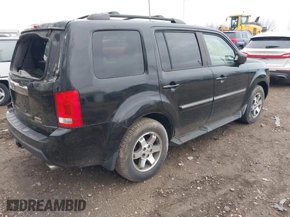 2009 Honda Pilot Touring with VIN 5FNYF48959B016978, listed as a IAAI auction lot 41947782 with 234,115 mi miles and . Bid and sale history available at carsss.com. Image 4.