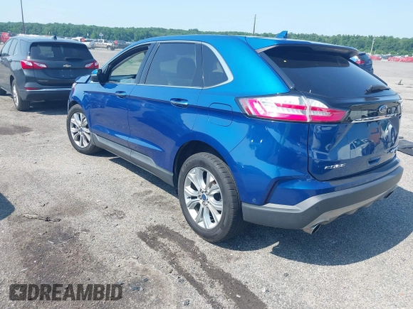 2020 Ford Edge Titanium with VIN 2FMPK4K96LBA55482, listed as a IAAI auction lot 42557716 with 61,509 mi miles and . Bid and sale history available at DreamBid. Image 3.