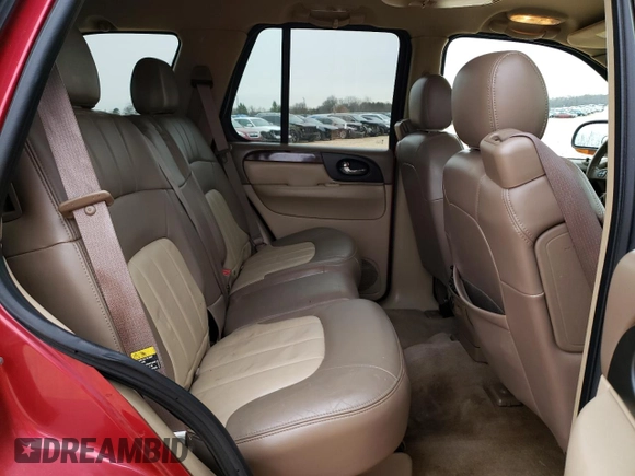 2004 GMC Envoy SLT with VIN 1GKDT13S342262833, listed as a Copart auction lot 87828975 with 203,404 mi miles and Salvage Title. Bid and sale history available at carsss.com. Image 11.