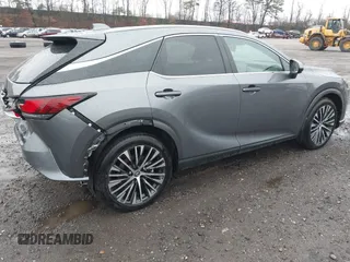 2023 Lexus RX 350h with VIN 2T2BBMCAXPC006429, listed as a IAAI auction lot 41924364 with 21,548 mi miles and . Bid and sale history available at DreamBid. Image 4.