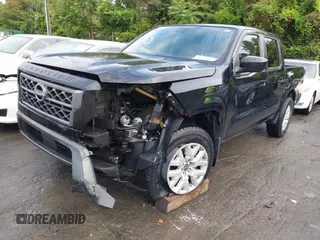2023 Nissan Frontier SV with VIN 1N6ED1EK7PN609865, listed as a IAAI auction lot 42242070 with 56,462 mi miles and . Bid and sale history available at DreamBid. Image 2.