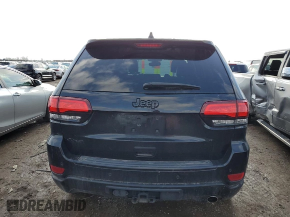 2017 Jeep Grand Cherokee Altitude z VIN 1C4RJFAG4HC714596, wystawiony jako Copart lot #51675295 z przebiegiem 138 928 mil mil oraz Szkoda całkowita • Salvage title. Historia ofert i sprzedaży dostępna na DreamBid. Obrazek 6.