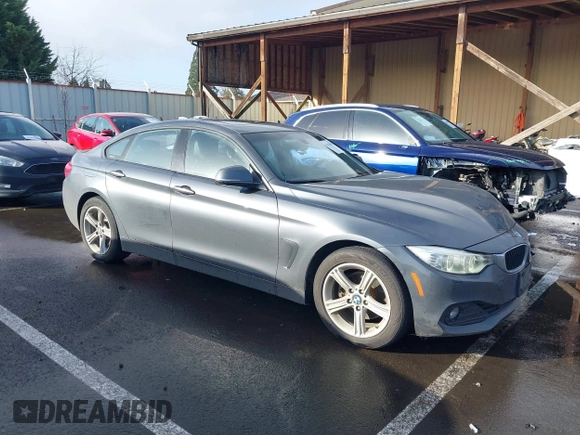 2015 BMW 4 Series 428i xDrive with VIN WBA4C9C55FD331207, listed as a IAAI auction lot 41636906 with 131,306 mi miles and . Bid and sale history available at DreamBid. Image 1.