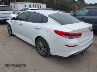 2019 Kia Optima LX with VIN 5XXGT4L30KG300576, listed as a IAAI auction lot 40753034 with 113,721 mi miles. Bid and sale history available at carsss.com. Image 3.