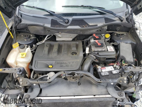 2014 Jeep Patriot Latitude with VIN 1C4NJRFB2ED718259, listed as a Copart auction lot 58095825 with 116,665 mi miles and Salvage title. Bid and sale history available at DreamBid. Image 12.