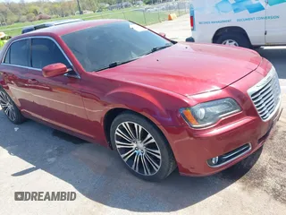 2014 Chrysler 300 S with VIN 2C3CCABG7EH136010, listed as a IAAI auction lot 42010133 with 146,896 mi miles and . Bid and sale history available at DreamBid. Image 1.