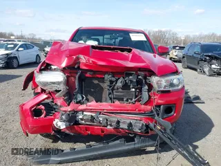 2016 Toyota Tacoma SR5 with VIN 3TMDZ5BN9GM012720, listed as a IAAI auction lot 41664651 with 119,010 mi miles and . Bid and sale history available at DreamBid. Image 12.