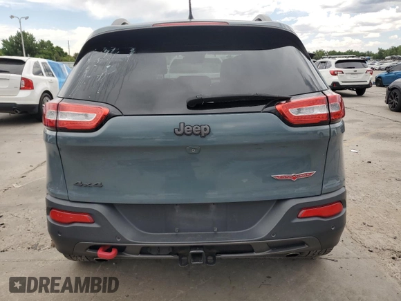 2015 Jeep Cherokee Trailhawk с VIN 1C4PJMBSXFW555223, выставлен на аукционе Copart как лот 62072235 с пробегом 207 240 миль миль и На запчасти • Non repairable. История ставок и продаж доступна на DreamBid. Изображение 6.