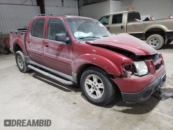 2005 Ford Explorer Sport Trac XLS with VIN 1FMZU77KX5UA12440, listed as a Copart auction lot 42966185 with 209,959 mi miles and Salvage title. Bid and sale history available at DreamBid. Image 4.