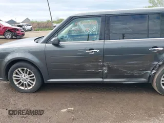 2016 Ford Flex SEL z VIN 2FMGK5C82GBA21945, wystawiony jako IAAI lot #42206498 z przebiegiem 141 320 mil mil oraz . Historia ofert i sprzedaży dostępna na DreamBid. Obrazek 14.