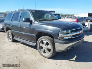 2004 Chevrolet Tahoe LS with VIN 1GNEC13VX4J209988, listed as a IAAI auction lot 41868400 with 256,191 mi miles. Bid and sale history available at carsss.com. Image 1.