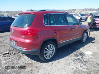 2016 Volkswagen Tiguan S with VIN WVGBV7AX4GW021564, listed as a IAAI auction lot 41995637 with 96,167 mi miles and . Bid and sale history available at DreamBid. Image 4.