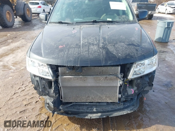 2019 Dodge Journey SE with VIN 3C4PDCBB1KT694545, listed as a IAAI auction lot 41642930 with 103,935 mi miles and . Bid and sale history available at DreamBid. Image 12.