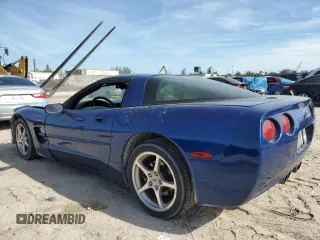 2002 Chevrolet Corvette with VIN 1G1YY22G225103095, listed as a Copart auction lot 87363014 with 212,379 mi miles and Salvage Title. Bid and sale history available at carsss.com. Image 2.