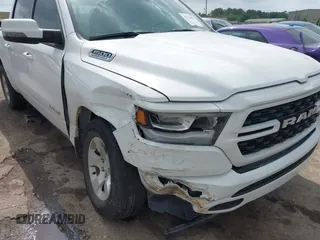 2023 Ram 1500 Big Horn with VIN 1C6SRFFT4PN532343, listed as a IAAI auction lot 42111051 with 15,079 mi miles and . Bid and sale history available at DreamBid. Image 6.