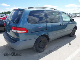2002 Toyota Sienna LE with VIN 4T3ZF13C62U479542, listed as a IAAI auction lot 42295904 with 199,041 mi miles and . Bid and sale history available at DreamBid. Image 4.
