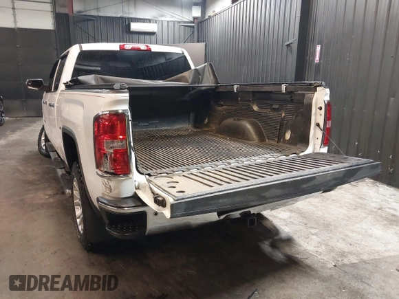 2018 GMC Sierra 1500 SLE z VIN 3GTU2MEC5JG104843, wystawiony jako IAAI lot #42447744 z przebiegiem 136 874 mil mil oraz . Historia ofert i sprzedaży dostępna na DreamBid. Obrazek 3.