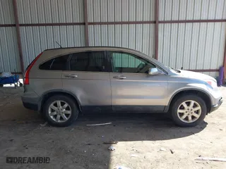 2007 Honda CR-V EX-L with VIN JHLRE387X7C069804, listed as a IAAI auction lot 41616256 with 136,271 mi miles. Bid and sale history available at carsss.com. Image 14.