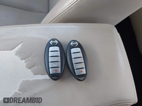 2015 Nissan Altima SL z VIN 1N4BL3AP2FC571645, wystawiony jako IAAI lot #42095010 z przebiegiem 124 881 mil mil oraz . Historia ofert i sprzedaży dostępna na DreamBid. Obrazek 11.