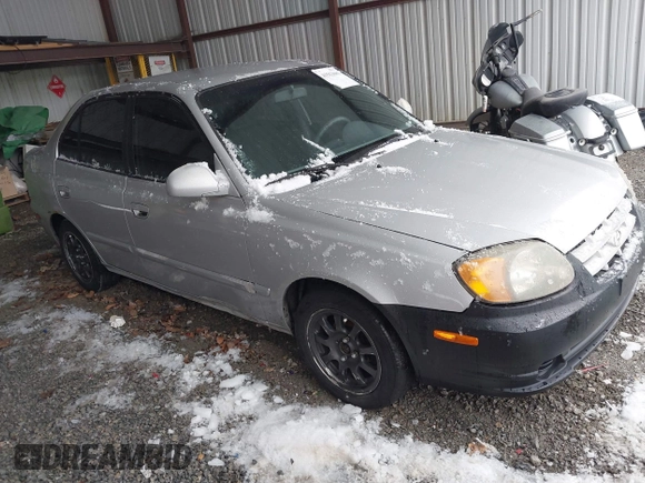 2005 Hyundai Accent GLS with VIN KMHCG45C75U656548, listed as a IAAI auction lot 41553603 with 178,070 mi miles. Bid and sale history available at carsss.com. Image 1.